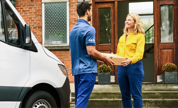 Business customer receiving parcel from GLS
