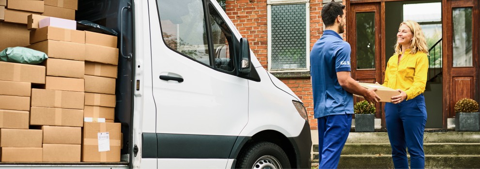 Business customer receiving parcel from GLS