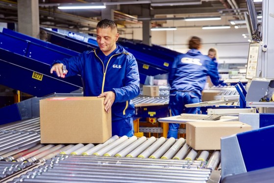 GLS parcel being packed at an e-commerce warehouse