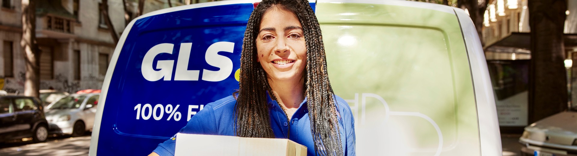 gls delivery woman grabing some parcels