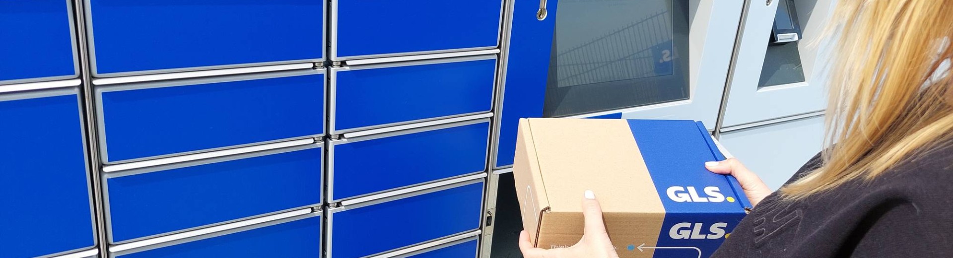 GLS customer collecting a parcel from a GLS locker