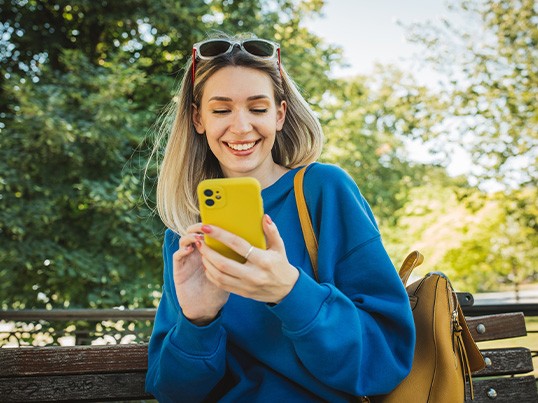 girl checking her smartphone