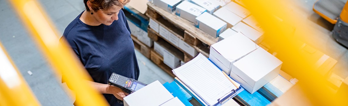 GLS worker checking on parcel labels