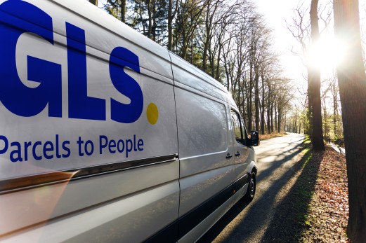 Long distance GLs truck drives between field and forest